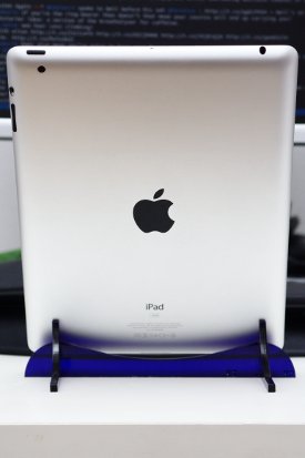 The iPad stand supporting the iPad in portrait mode, from the rear.